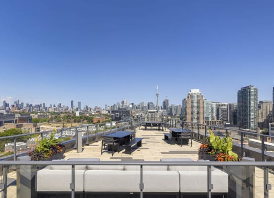a view of the city from a roof top terrace