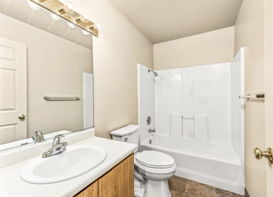 Bathroom with a sink toilet and a shower at Meadowview Apartments, Santa Rosa, CA