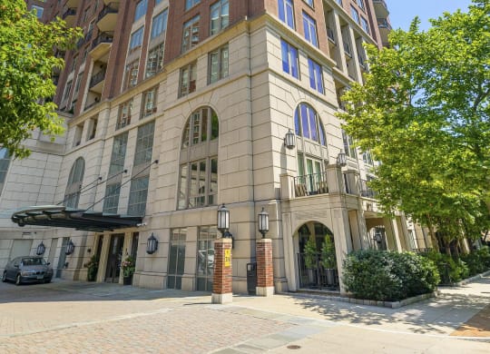 a tall building on the corner of a city street at HIGHGROVE, Stamford, CT, 06901