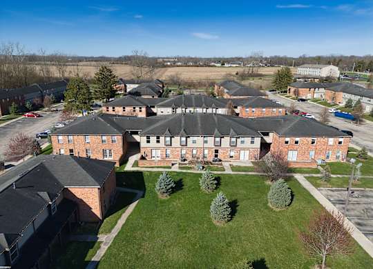 an aerial view of a group of houses in a neighborhood