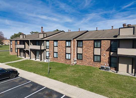 our apartments feature a spacious courtyard with grass