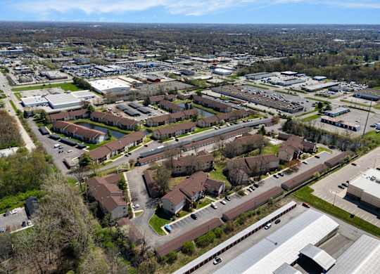 an aerial view of a neighborhood of houses in a city