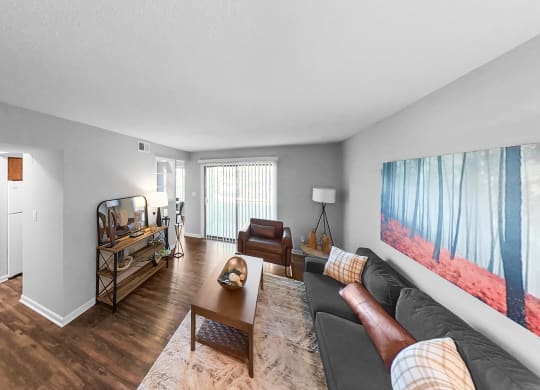 a living room with a couch and a table