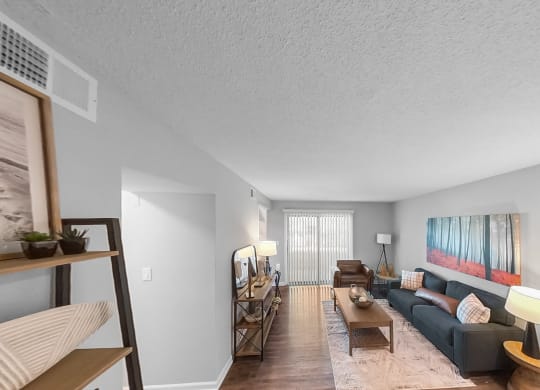 a living room with a couch and a table