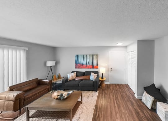 a living room with two couches and a coffee table