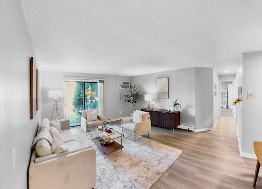 a living room with two couches and a table
