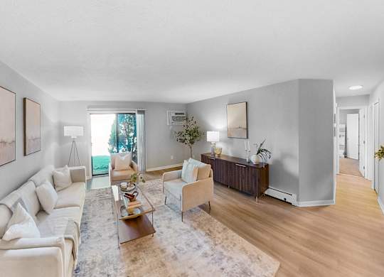 a living room with a couch and a table