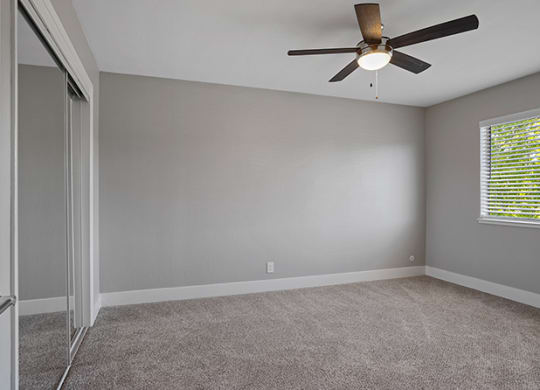 Carpeted Bedroom Space at Colonial Garden Apartments, San Mateo