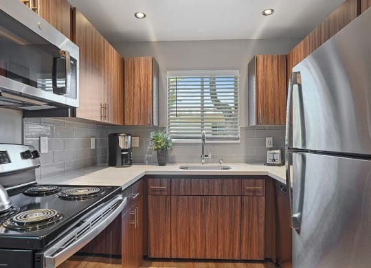 Fully Equipped Kitchen at Colonial Garden Apartments, California