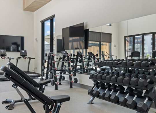 Gym with free weights at Solhavn Apartments, American Fork, UT