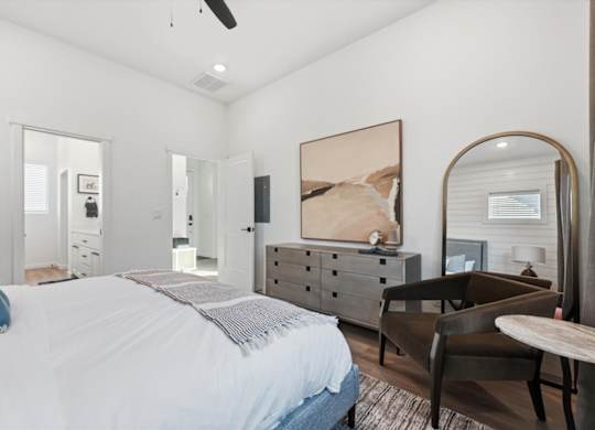 Bedroom with a large bed at Alante Homes at Spring Run, Idaho