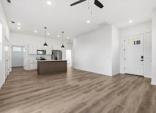 Unfurnished living room and Kitchen view at Alante Homes at Spring Run, Caldwell