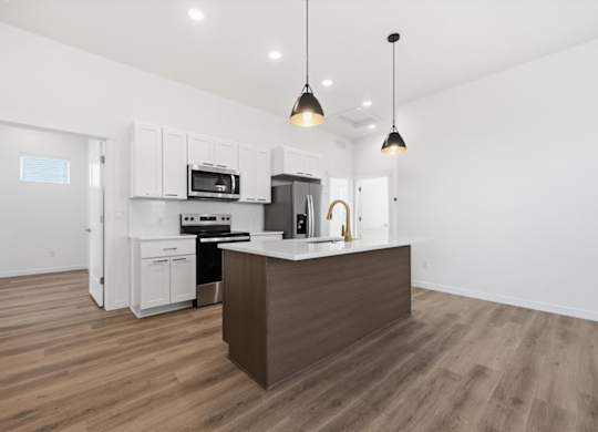 Kitchen with ambient lights at Alante Homes at Spring Run, Caldwell, ID