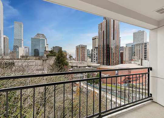 Balcony overlooking cityscape at AVIA on Pike Street, Seattle, WA, 98101