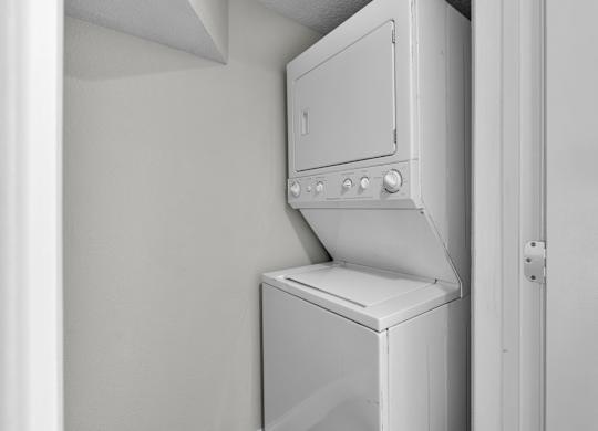 Stacked washer dryer at Avia Apartments at Reedy Creek, Florida