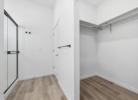 Bathroom with attached closet at Alante Homes at Spring Run, Caldwell, ID