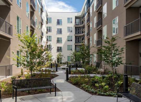 Courtyard with benches ground level at SevenO2 Main Apartments, Salt Lake City, UT