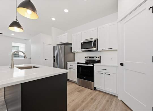 Kitchen with countertop at Alante Homes at Spring Run, Caldwell, Idaho