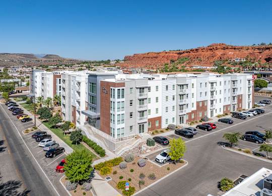Apartment view from the top showing parking lot and cars 605 Place Student Housing & Co-Living, St George