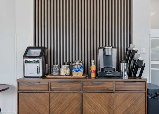 a counter with a coffee machine and a toaster on it at 605 Place Student Housing & Co-Living, St George