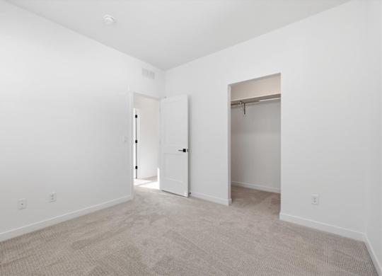 Room with attached closet at Alante Homes at Spring Run, Idaho, 83607