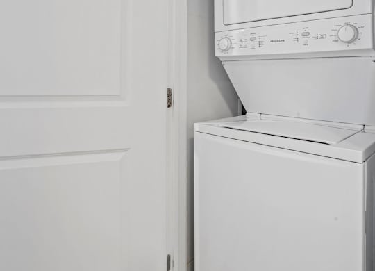 an empty laundry room with a washer and dryer at 605 Place Student Housing & Co-Living, St George, Utah