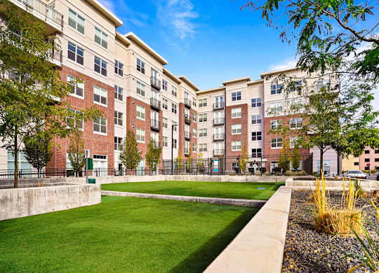 Large grass area in front of apartment at 200 City View, Provo