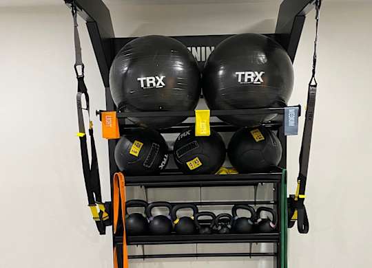 Gym with weights at Avia Lofts at Maple Road, Amherst