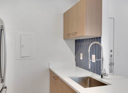 Kitchen with Sink at AVIA Apartments On Alpha, Dallas