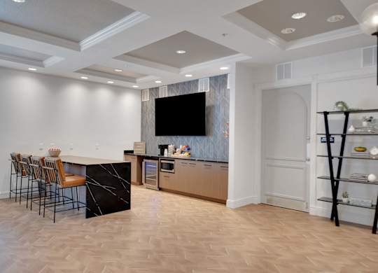Kitchen with bar at AVIA Apartments On Alpha, Dallas