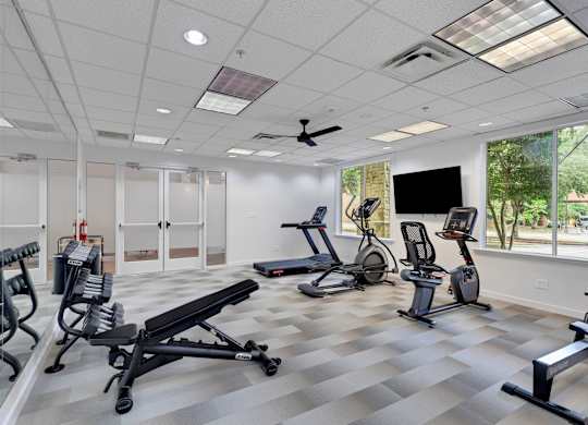Gym at AVIA Apartments On Alpha, Dallas, TX