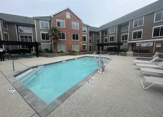 Pool side view at AVIA Apartments On Alpha, Dallas