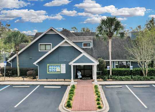 Parking lot front view at AVIA Lofts on Liberty Ridge, Apartments, Florida