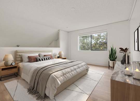 A well-lit bedroom at AVIA Lofts on Parkway, Vancouver, Washington