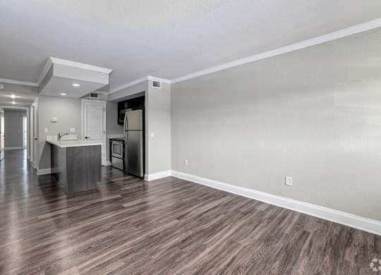 Empty Living Room at Avia Apartments at Reedy Creek, Kissimmee, FL