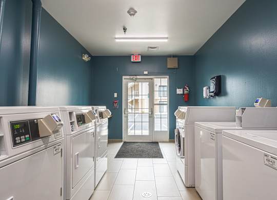 Community laundry room at AVIA Lofts on Victors Way, Michigan , 48108