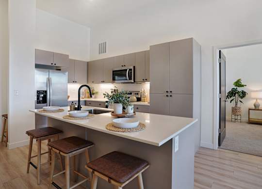 Kitchen with a bar stool at Solhavn Apartments, American Fork, UT