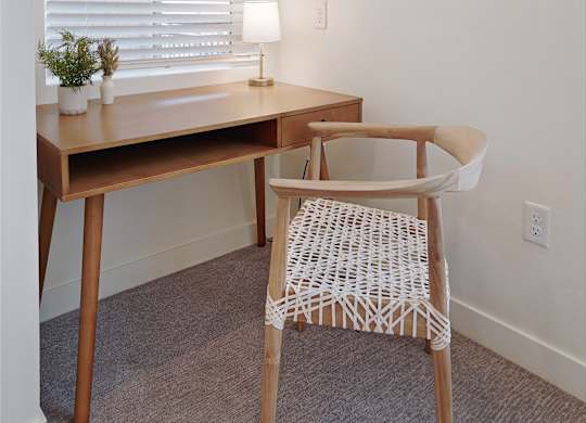Room with chair and desk at Solhavn Apartments, American Fork, UT