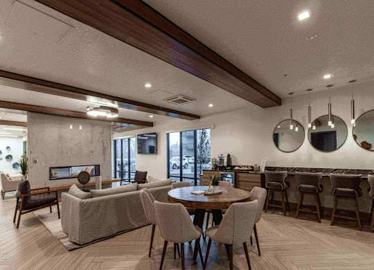 clubhouse with couch at The Flats at Riverwoods, Provo
