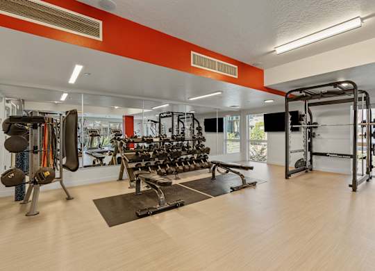 a fitness room with weights and cardio equipment at the apartments at Paperbox Lofts, Salt Lake City, 84101