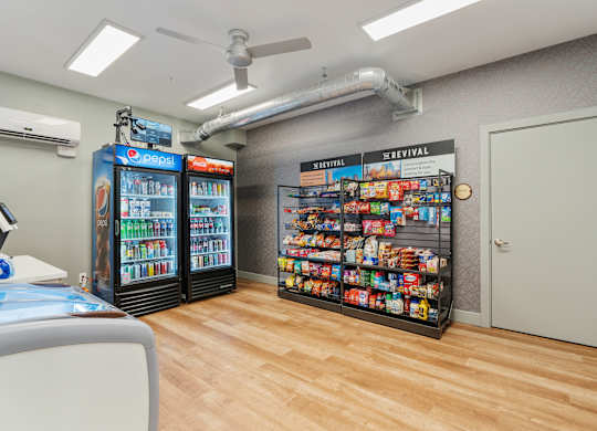 a convenience store with vending machines and a wood floor at The Revival, Utah