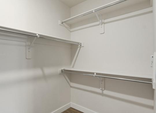 a spacious walk in closet in a 555 waverly unit at The Flats at Riverwoods, Utah