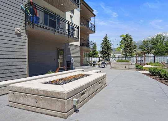 the courtyard at the whispering winds apartments in pearland, tx at The Flats at Riverwoods, Utah