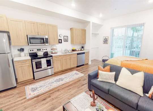 605 Place Studio kitchen w/couch at 605 Place Student Housing & Co-Living, St George, UT, 84770