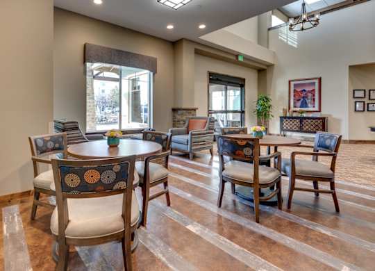 Community dining area with round tables at Mountain Lakes Estates Apartments, Reno, NV 89521