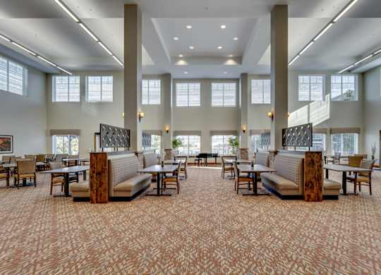 Community dining room with booth seating at Mountain Lakes Estates Apartments, Reno