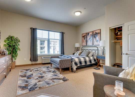 Studio apartment with bedroom and seating area at Mountain Lakes Estates Apartments, Nevada, 89521