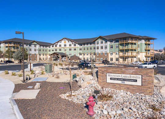 Property entrance sign with landscaping at Mountain Lakes Estates Apartments, Reno, Nevada