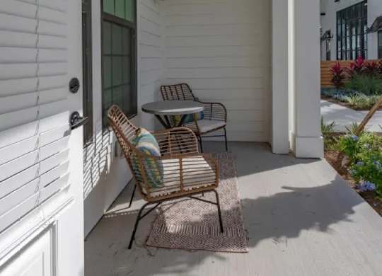 A patio with a table and chairs. at Atwater at Nocatee Apartments, Toledo