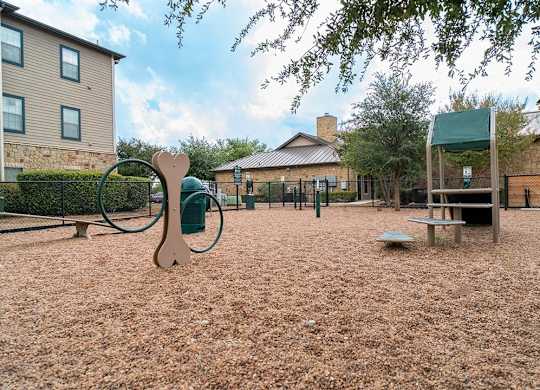 A playground with a seesaw and a slide.